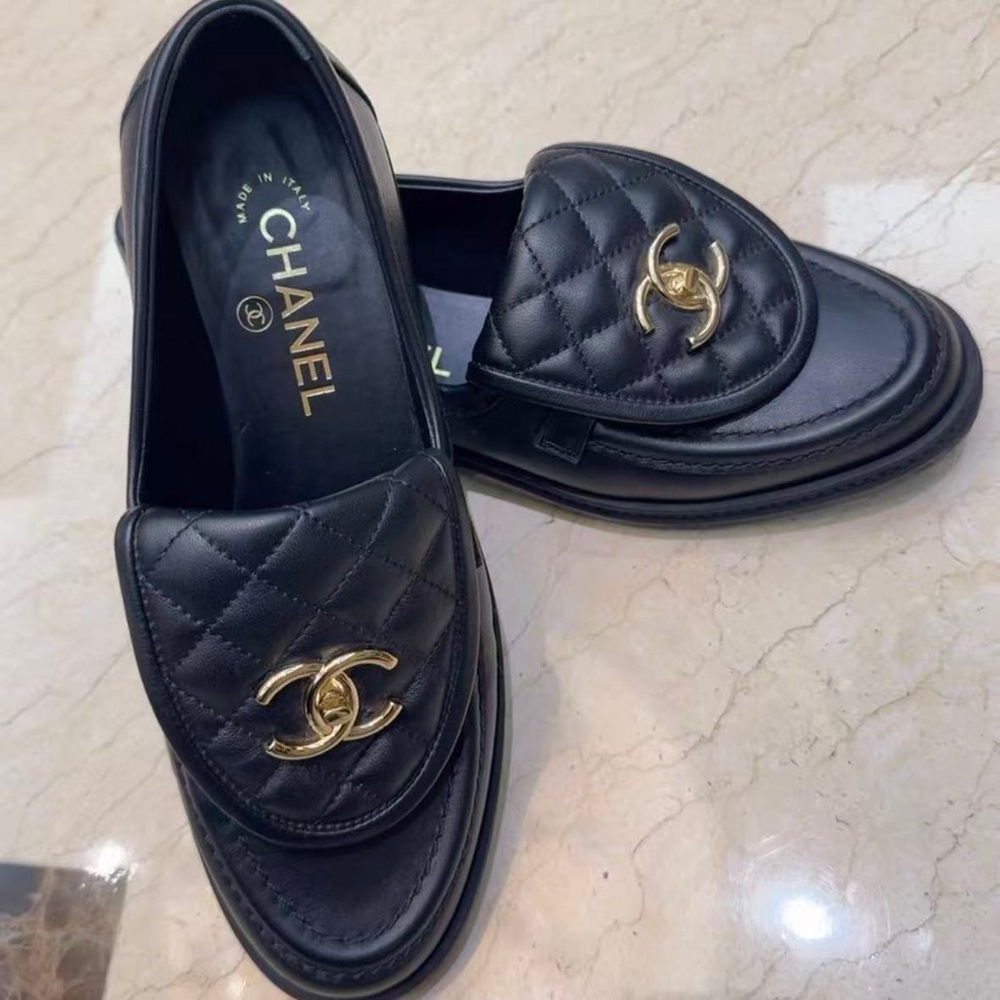 CHANEL Quilted Black Loafers with Gold Logo